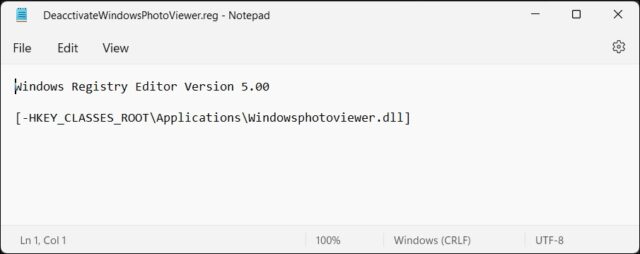 برنامه Notepad نمایش اسکریپت رجیستری برای غیرفعال کردن Windows Photo Viewer در ویندوز 11
