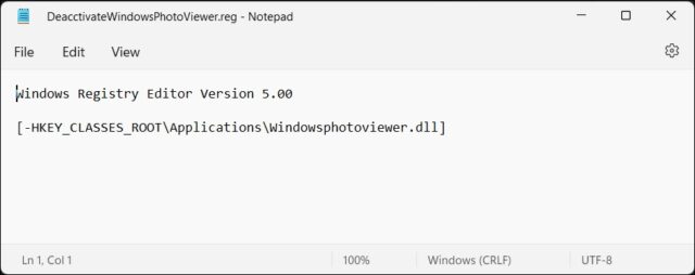 برنامه Notepad نمایش اسکریپت رجیستری برای غیرفعال کردن Windows Photo Viewer در ویندوز 11