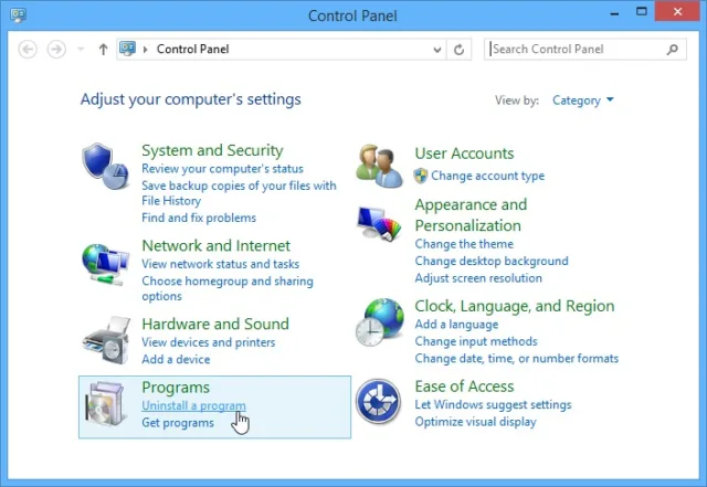 گزینه "Uninstall a program" را انتخاب کنید (در دسته‌بندی Programs).