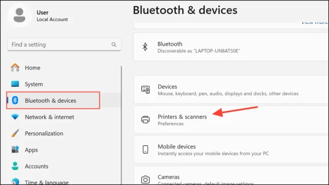 گزینه Bluetooth و دستگاه‌ها را انتخاب کنید، سپس روی Printers & scanners کلیک کنید