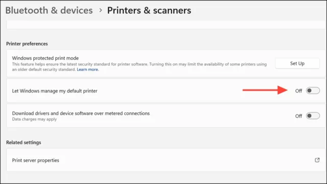 گزینه‌ای با عنوان Let Windows manage my default printer را پیدا کنید. این گزینه را غیرفعال (Off) کنید