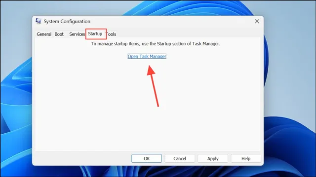 به تب Startup بروید و روی گزینه Open Task Manager کلیک کنید.